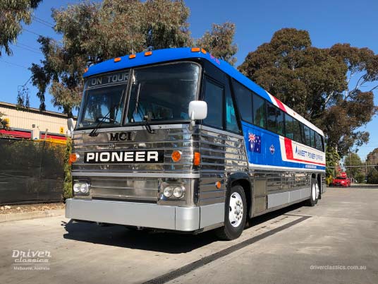 1976 MCI MC8, restoration nearing completion, Mt Waverley VIC, September 2019 MCI MC8 bus (1976 version), front and side, restoration nearing completion, Pepsi red white and blue stripes, Mt Waverley VIC, Photo taken September 2019