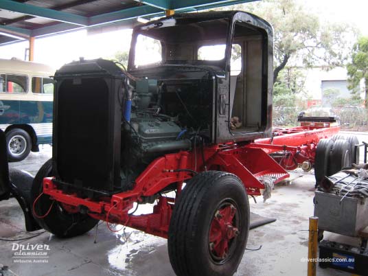 1977 Kenworth W925 body assembly during restoration. The cab was planned to be black but later changed to silver. 1977 Kenworth W925 truck body assembly during restoration
